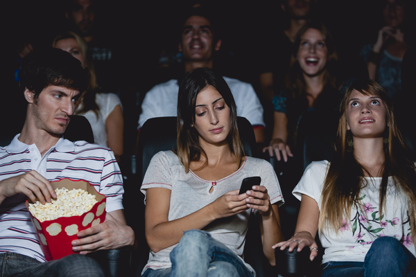 Texting While Watching a Movie