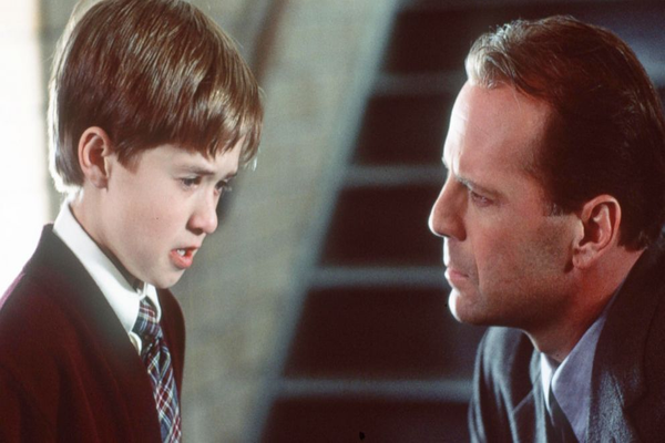 Haley Joel Osment and Bruce Willis in The Sixth Sense